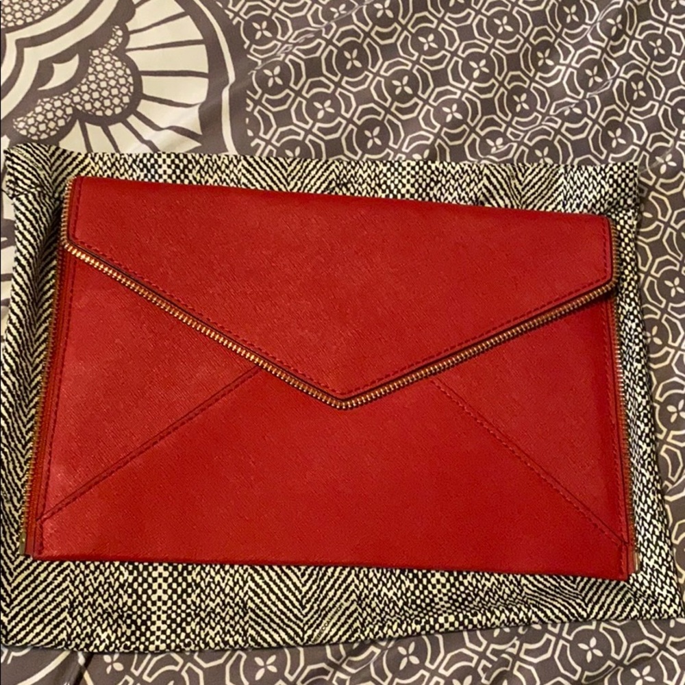 Rebecca minkoff clutch with gold zipper detail